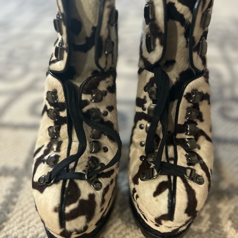 Alaia Black and White Ankle Boots with Bold Design